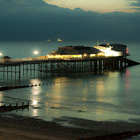 Buy canvas prints of Cromer Pier at Dusk  by Rob Hawkins