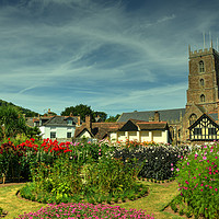 Buy canvas prints of Dunster Church and secret garden  by Rob Hawkins
