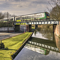Buy canvas prints of Train v Canal  by Rob Hawkins