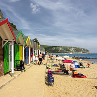 Buy canvas prints of Swanage beach huts  by Rob Hawkins
