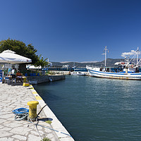 Buy canvas prints of Corfu Fishing Boat  by Rob Hawkins