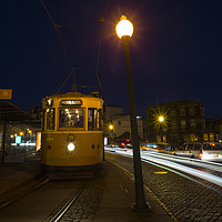 Buy canvas prints of Porto Night Tram  by Rob Hawkins