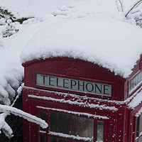 Buy canvas prints of Phone Box in the Snow  by Rob Hawkins