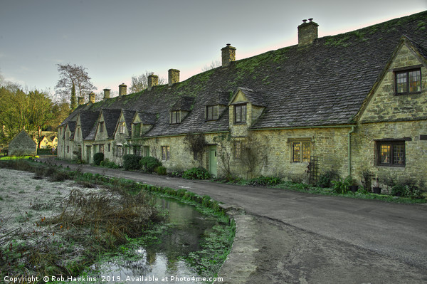 Winter at Bibury Almhouses Picture Board by Rob Hawkins