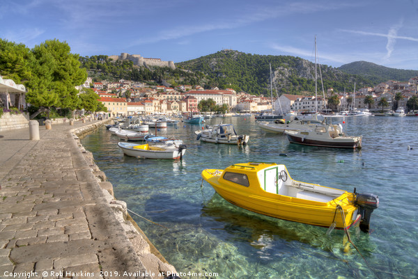 Yellow boat of Hvar  Picture Board by Rob Hawkins