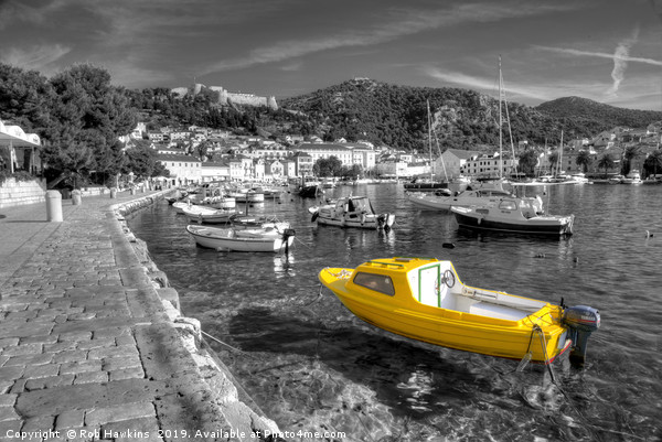 Yellow boat of Hvar in mono Picture Board by Rob Hawkins
