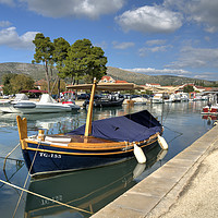 Buy canvas prints of Trogir Canal  by Rob Hawkins
