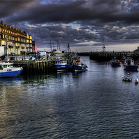 Buy canvas prints of West Bay at dusk by Rob Hawkins