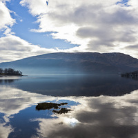 Buy canvas prints of Reflections on Loch Lomond by Douglas Kerr