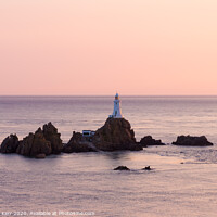 Buy canvas prints of La Corbière lighthouse at sunset, Jersey. by Douglas Kerr
