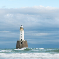 Buy canvas prints of Rattray Head Lighthouse in splashing waves by Douglas Kerr