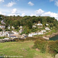 Buy canvas prints of Polperro is a large village, civil parish, and fishing harbour within the Polperro Heritage Coastline in south Cornwall, England. by Terry Senior