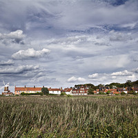 Buy canvas prints of Moody Skies over Cley Windmill by Paul Macro