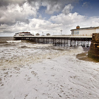 Buy canvas prints of Storms around the Pier by Paul Macro