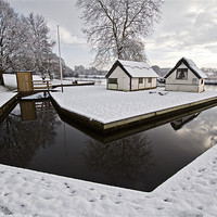 Buy canvas prints of Coltishall Boat Houses in Winter by Paul Macro