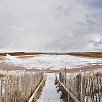 Buy canvas prints of Snow Storm over Holkham Beach by Paul Macro
