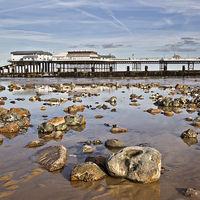 Buy canvas prints of Cromer Pier Reflections by Paul Macro