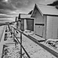 Buy canvas prints of Snow (I mean Beach) Huts at Overstrand by Paul Macro