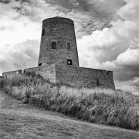 Buy canvas prints of Old Windmill, Bamburgh Castle by Chris Turner