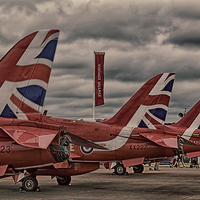 Buy canvas prints of  RIAT 2015 - Red Arrows on the ground by Chris Turner