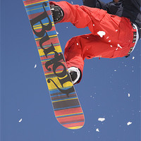 Buy canvas prints of Snowboard jumping on Vogel mountain by Ian Middleton
