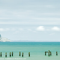 Buy canvas prints of Swanage Old Pier with Old Harry in the distance by Ian Middleton