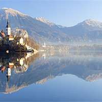 Buy canvas prints of Reflections on Lake Bled by Ian Middleton