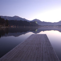 Buy canvas prints of Dawn breaks over Lake Bled by Ian Middleton