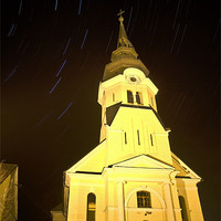 Buy canvas prints of Star trails behind Vodice Church by Ian Middleton