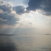 Buy canvas prints of Sunrays scattered by clouds over Trieste Bay by Ian Middleton