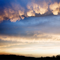 Buy canvas prints of Cumulonimbus with Mammatus clouds by Ian Middleton