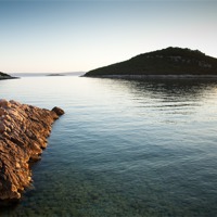Buy canvas prints of Cunski coastline at sunrise, Losinj Island by Ian Middleton