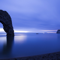 Buy canvas prints of Durdle Door at Dusk by Ian Middleton