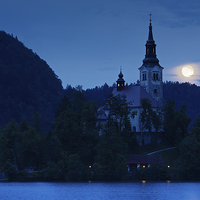 Buy canvas prints of Supermoon over bled Island Church by Ian Middleton