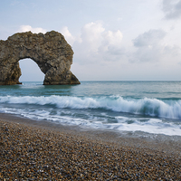 Buy canvas prints of Durdle Door in the evening by Ian Middleton