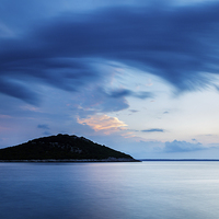 Buy canvas prints of Storm moving in over Veli Osir Island at sunrise by Ian Middleton