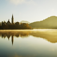 Buy canvas prints of Morning light at Lake Bled by Ian Middleton