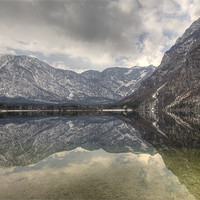 Buy canvas prints of Reflections of the Julian Alps by Ian Middleton