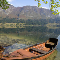 Buy canvas prints of Tranquil alpine lake. by Ian Middleton