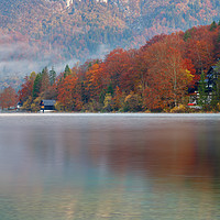 Buy canvas prints of Autumn morning over Lake Bohinj by Ian Middleton