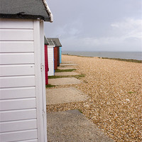 Buy canvas prints of Colourful beach huts in Calshot by Ian Middleton