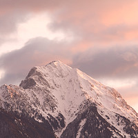Buy canvas prints of Mountain peak at sunrise by Ian Middleton