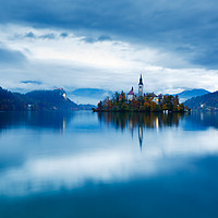 Buy canvas prints of Autumn dusk at Lake Bled by Ian Middleton