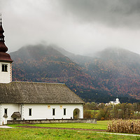 Buy canvas prints of Church just outside Bohinjska Bistrica by Ian Middleton