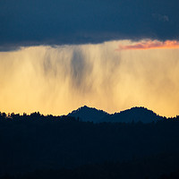 Buy canvas prints of Rain at sunset over the Ljubljana hills by Ian Middleton