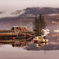 Buy canvas prints of Misty morning reflections of Loch Ness by Ian Middleton