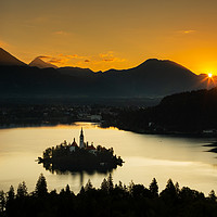 Buy canvas prints of Sunrise over Lake Bled from Ojstrica by Ian Middleton