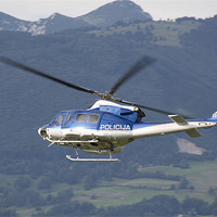 Buy canvas prints of Police helicopter patrolling by Ian Middleton