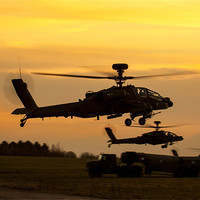 Buy canvas prints of Three AH64 Apache at Sunset by Oxon Images