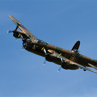 Buy canvas prints of Lancaster Bomber Banking by Oxon Images